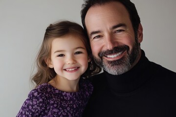 A heartwarming portrait of a father and daughter, radiating joy and affection, with a soft, light gray background and vibrant colors.