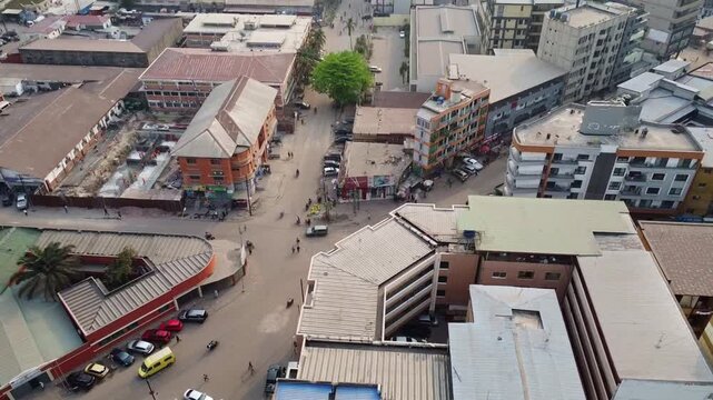 Birds eye view of a city street with buildings and traffic in yaound, cameroon