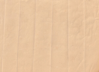 Fototapeta premium Beige folded paper texture background