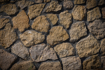 Old stone masonry wall background for photography
