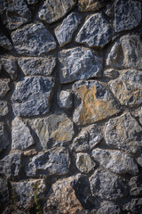 Rustic Mediterranean vertical stone masonry wall