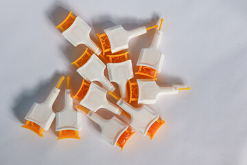 yellow colored lancet needles for random blood sugar Analysis. Diabetes is a chronic condition associated with abnormally high levels of sugar in the blood, isolated white backgroud