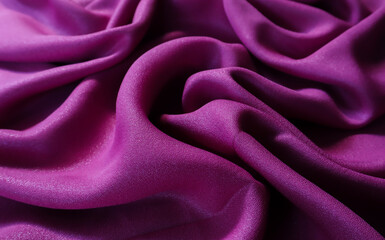 Fototapeta premium Purple fabric cloth texture for background and design art work, beautiful crumpled pattern of silk or linen.