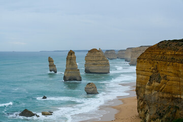 The Twelve Apostles limestone stacks along the Great Ocean Road in Victoria, Australia, a famous coastal landmark known for stunning cliffs, ocean views, and natural beauty.