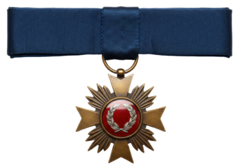 Bronze military medal with red center isolated on white, award for service and valor in armed forces, honor and recognition