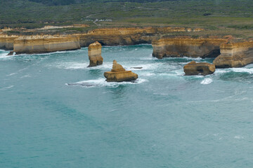 The Twelve Apostles limestone stacks along the Great Ocean Road in Victoria, Australia, a famous coastal landmark known for stunning cliffs, ocean views, and natural beauty.