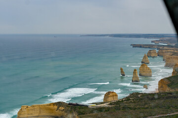 The Twelve Apostles limestone stacks along the Great Ocean Road in Victoria, Australia, a famous coastal landmark known for stunning cliffs, ocean views, and natural beauty.