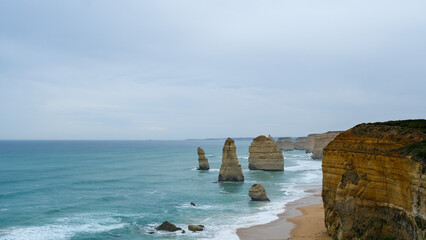 The Twelve Apostles limestone stacks along the Great Ocean Road in Victoria, Australia, a famous coastal landmark known for stunning cliffs, ocean views, and natural beauty.