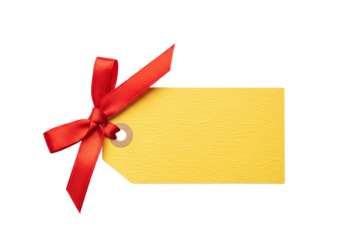 A bright yellow gift tag with a vibrant red satin ribbon tied in a bow isolated on a stark black background perfect for adding a personal touch to presents