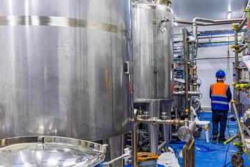 Stainless vertical steel tanks with equipment tank chemical cellar at the with stainless steel tanks cleaning and mixing