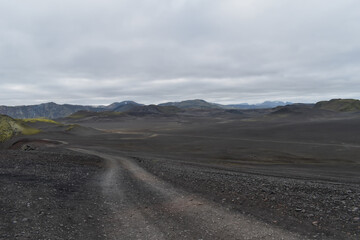 Road through volcanic wasteland, mountainous volcanic landscape