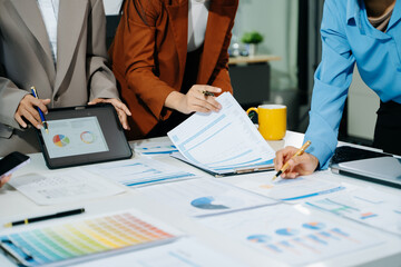  Business team meeting present.professional investor working with  Finance managers task. with laptop smart phone and digital tablet