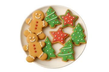 Christmas gingerbread men and decorated tree, star cookies on a white plate, festive holiday baking treats