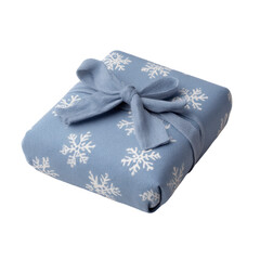 Naklejka premium Blue fabric wrapped gift with snowflake pattern and tied bow