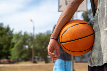 Young man seen with basketball