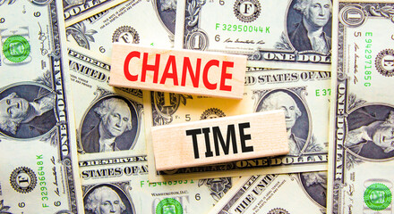 Chance time symbol. Concept word Chance time on beautiful wooden blocks. Dollar bills. Beautiful...
