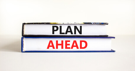 Plan ahead symbol. Concept word Plan ahead on beautiful books. Beautiful white paper background. Business plan ahead concept. Copy space.