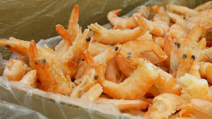 Close-up of many frozen shrimp