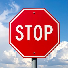 Octagonal red sign against a blue sky, displaying the word "STOP" in bold white capital letters