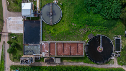 Aerial view circular clarifier tank at wastewater treatment plant, Industrial infrastructure,...