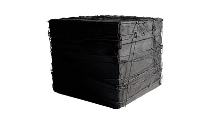 Dark, cube-shaped object wrapped in tangled wire
