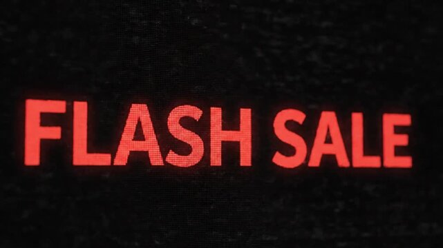 flash sale Red text against a dark background with static effect overlay