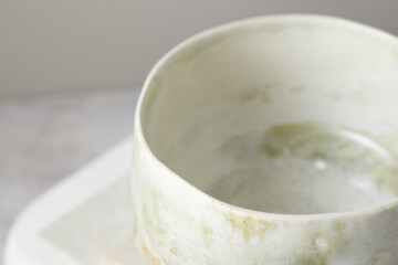 Tea bowl ceramic on gray background.