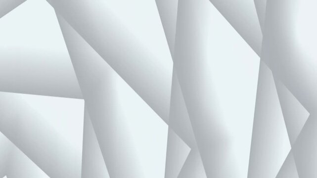 Abstract overlapping white and gray geometric shapes forming a dynamic pattern background