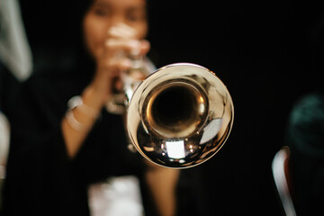 Close Up of Musician Playing Silver Trumpet on rehearsal studio 