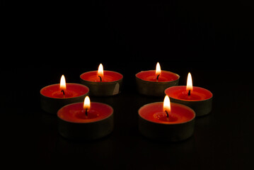 three burning candles
