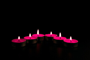 candles on a red background