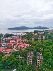 Aerial View Of Coastal Town of Sandakan With Colorful Homes