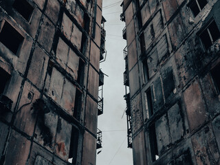ruined street and destroyed houses in Kiev war in Ukraine