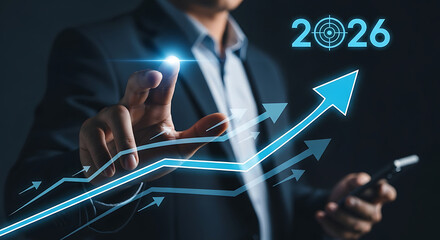 Businessman pointing at futuristic financial growth chart with rising arrow, 2026 forecast, business success, investment, market trend, and corporate strategy concept