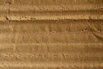 Abstract creased crumpled brown cardboard paper texture background design element