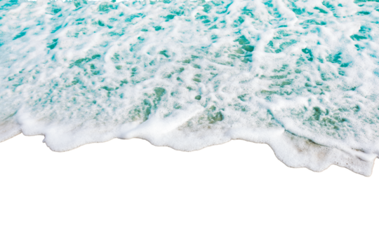 Foamy ocean wave gently rolls onto shore, creating serene and calming scene