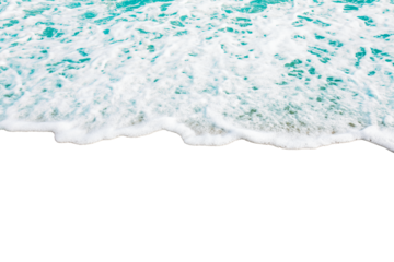Aerial view of ocean waves gently crashing onto sandy beach, creating soothing and tranquil scene