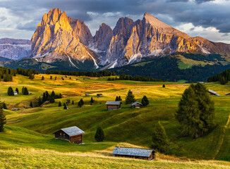 The UNESCO site Seiser Alm or Alpe di Siusi the Dolomite plateau and the largest high-elevation Alpine meadow in Europe located in Italy's South Tyrol province in the Dolomites in autumn sunset.