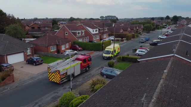 Drone. Fire engine and ambulance in urban street setting. 