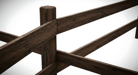 Obraz premium A rustic, weathered wooden fence with three long horizontal planks spanning vertical posts. The fence runs diagonally from left to right against a white background.