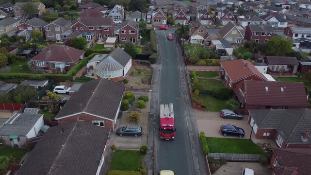 Drone. Fire engine and ambulance in urban street setting. 