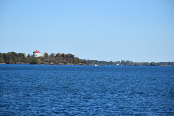 Naklejka premium The blue waters of the Saint Lawrence River, Kingston, Ontario, Canada