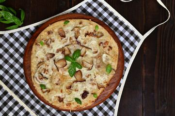 delicious autumn pizza with porcini mushrooms