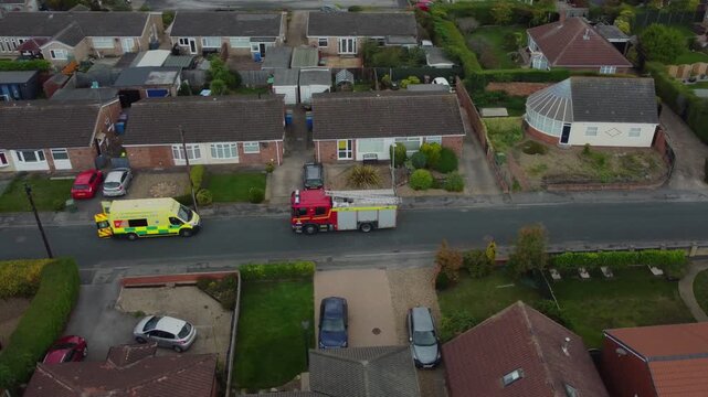 Drone. Fire engine and ambulance in urban street setting. 