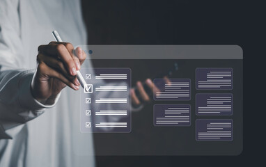 Smart task manager digital checklist tools with businessman using stylus on virtual interface, symbolizing workflow productivity, task tracking, project planning, and efficient business management.