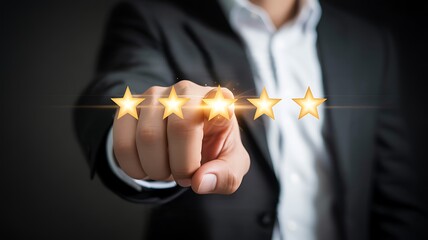 Businessman's Hand Touching Five Golden Stars for Rating