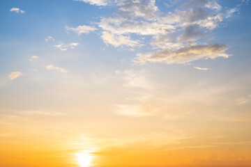 Beautiful , luxury soft gradient orange gold clouds and sunlight on the blue sky perfect for the background, take in evening,Twilight, Large size, high definition landscape photo