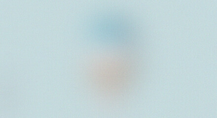 Abstract soft focus background with pastel blue and peach tones