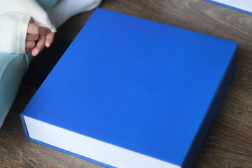 blue box for merchandise on the wooden floor