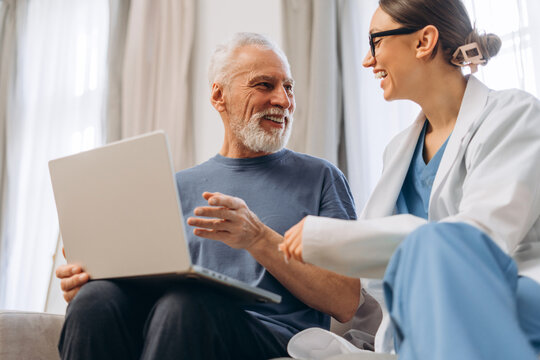 Doctor explaining medical information to a senior patient
